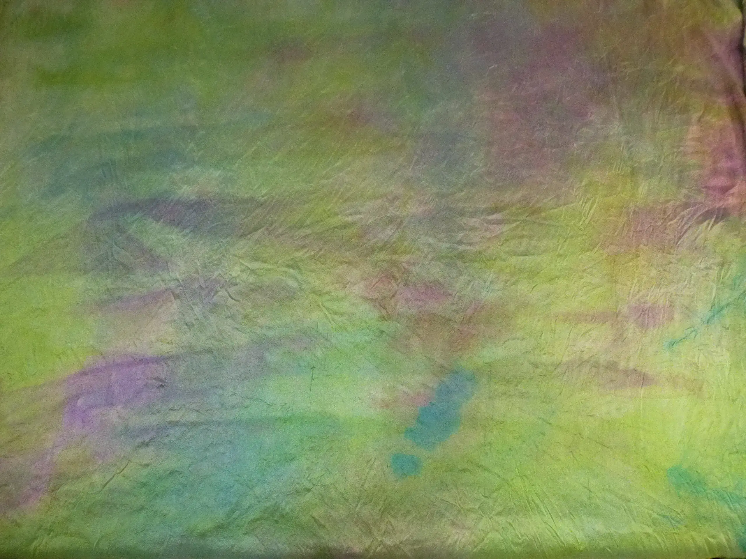 Colorful abstract texture with green and purple.